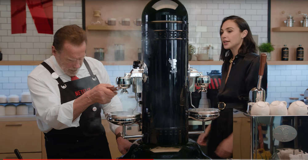 Gal Gadot and Arnold Schwarzenegger making coffee using Bezzera Verticale Black Eagle 2 Group Coffee Machine